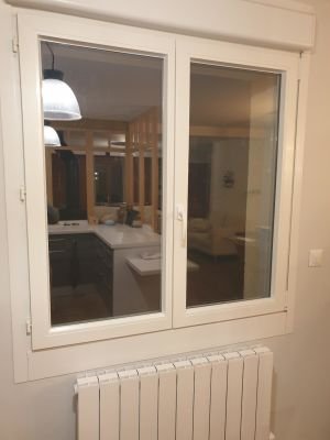 Porte PVC après remplacement de son double vitrage